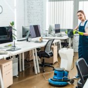 Professioal cleaner cleaning the office floor